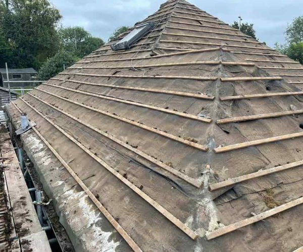 This is a photo of a hip roof that has been stripped back to the battens, and is awaiting a new roof covering to be installed. Works carried out by EFG Roofing Maltby